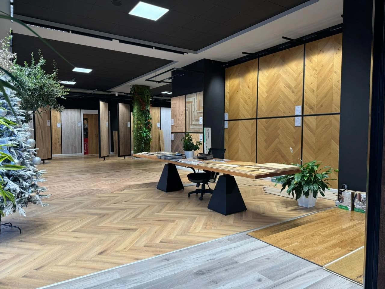 Hoxhalli Parket showroom and flooring displays in Tirana